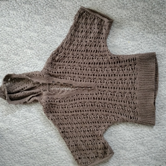 This is a Free People Pointelle Open Knit Alpaca Hooded Sweater in brown. Small - Picture 5 of 13